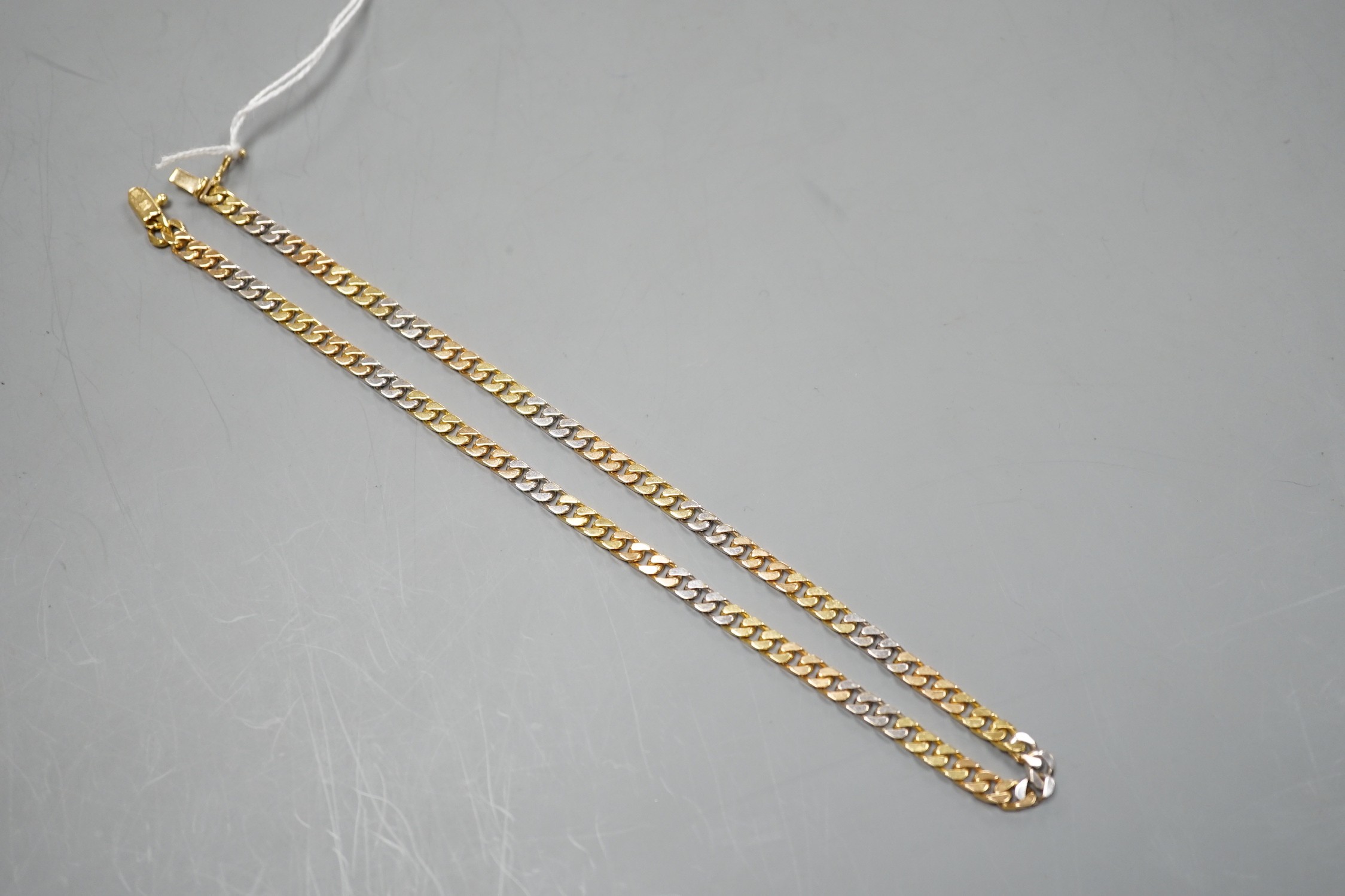 A modern three colour 18ct gold curb link chain, 39cm, 28.8 grams.